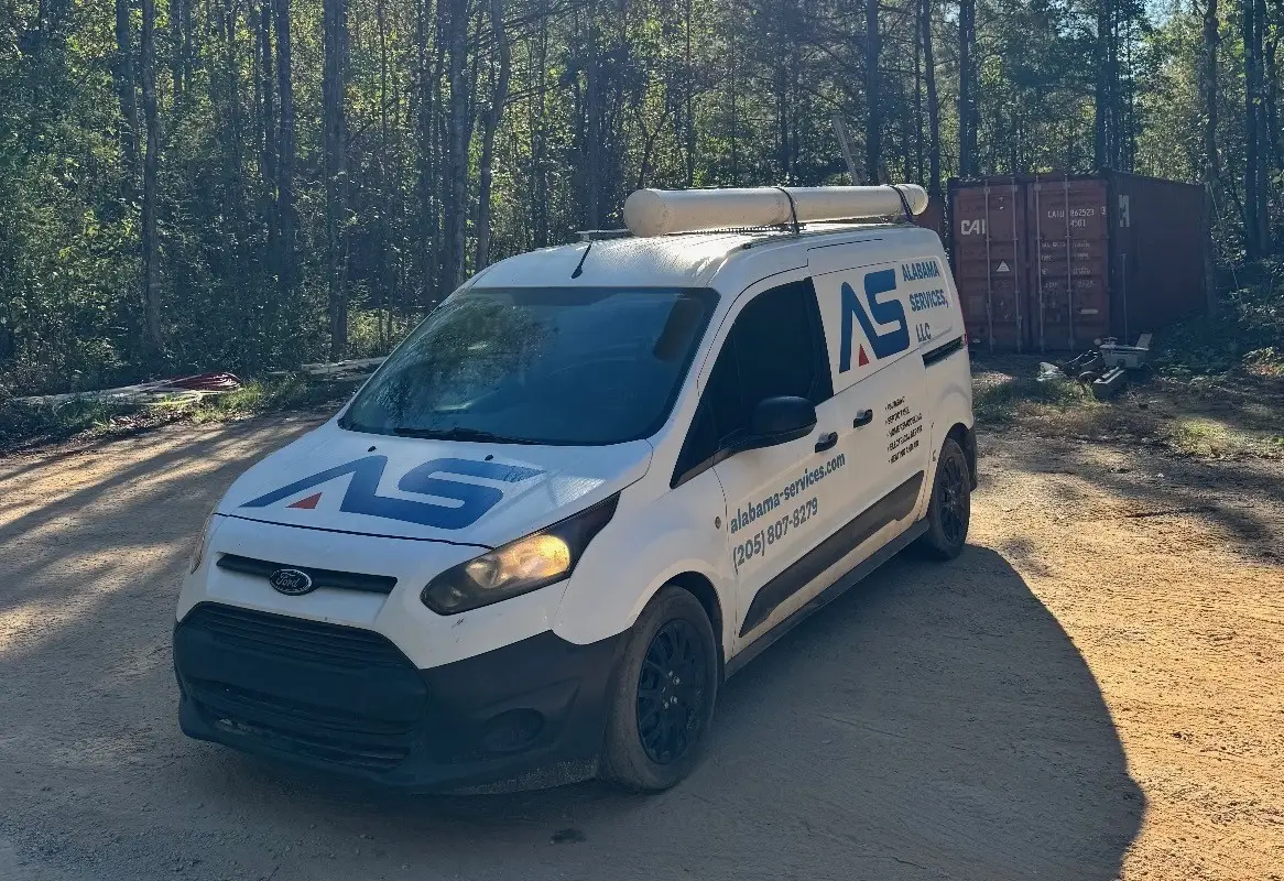 Alabama Services service van with the AS logo