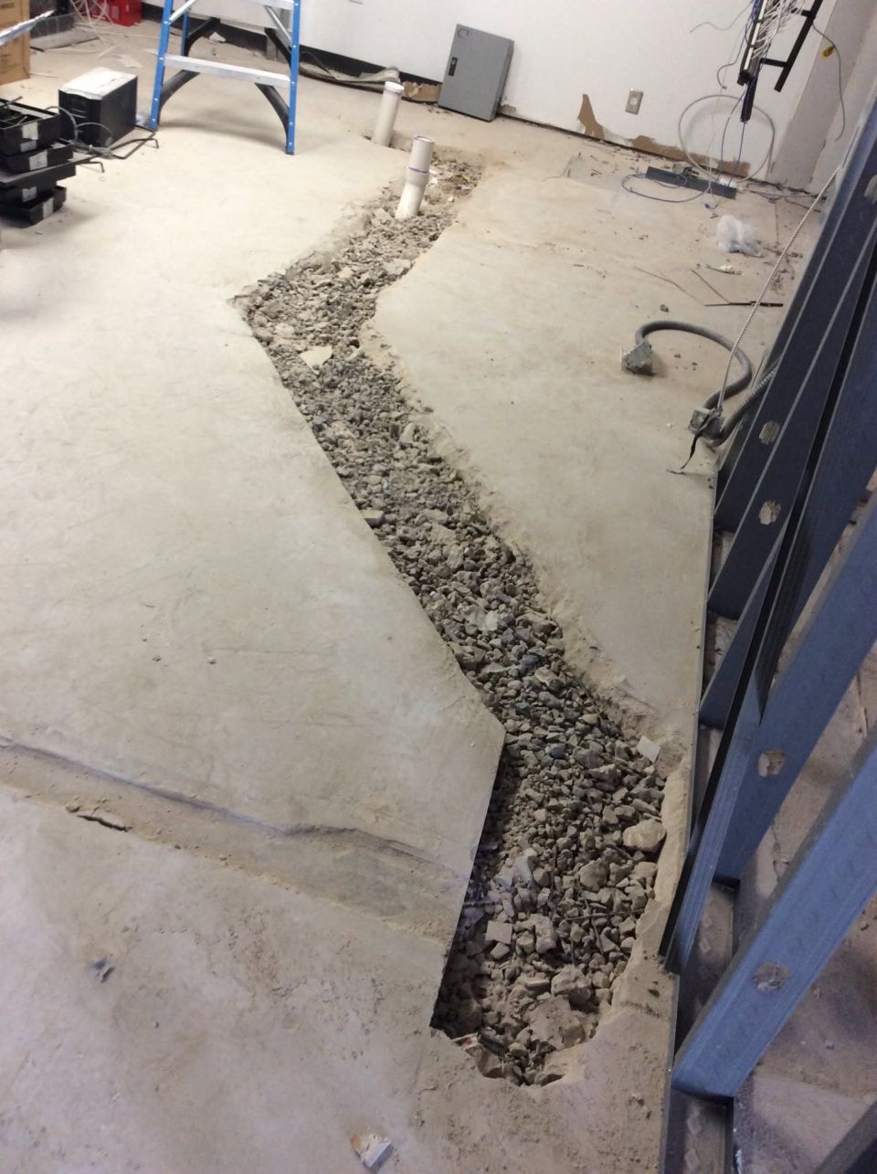 Concrete Slab Cut to Repair Underground Plumbing